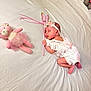 adorable, baby, bed, butterfly_wand, child, cute, headband, indoors, infant, newborn, peaceful, pink_bow, pink_teddy_bear, portrait, resting, sleeping, soft_toy, tutu, white_bed_sheet, white_lace_outfit