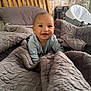 Kayson-Jay is registered to the contest to win money with this photo: baby, smiling, bed, blanket, wooden_bed_frame, pillow, indoor, cozy, infant, face, child, wallpaper, bassinet, quilt, person, portrait, home, happy, cute, soft_lighting