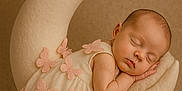 Luna participe au concours pour gagner de l'argent avec cette photo : baby, background, butterflies, child, crescent_moon, cute, decor, dress, infant, newborn, peaceful, portrait, props, resting, sleeping, soft_texture, soft_toys, stars, studio, warm_lighting