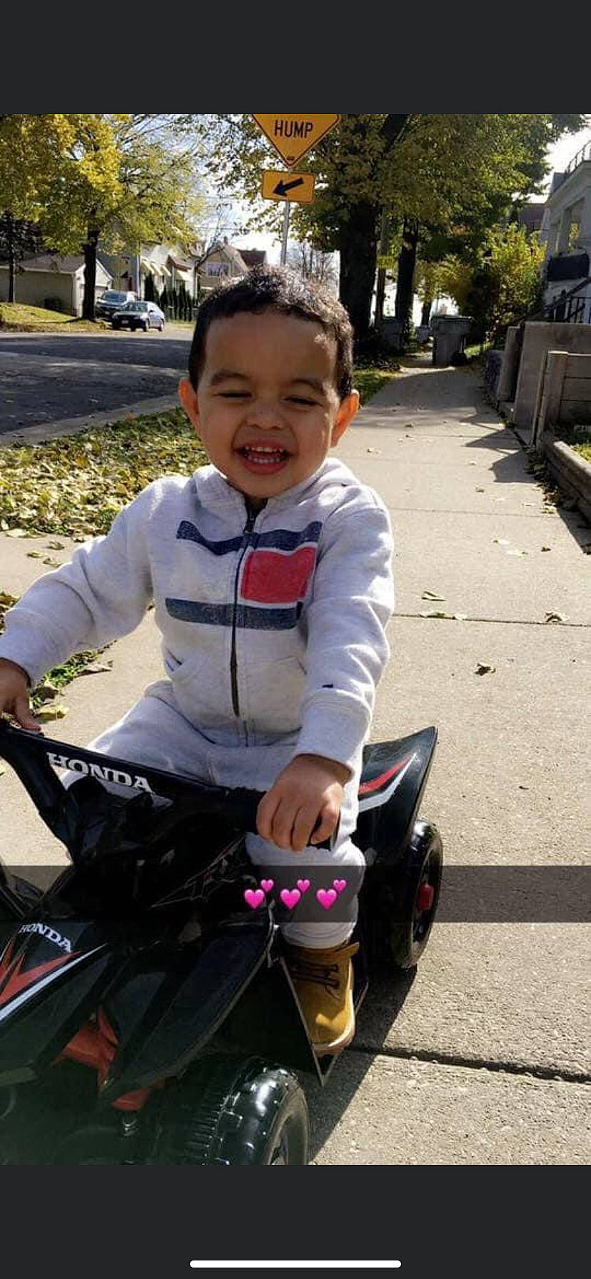 Luis is registered to the contest to win money with this photo: baby_carriage, bicycle, bicycle_accessory, bicycle_frame, bicycle_handlebar, bicycle_part, bicycle_tire, bicycle_wheel, bicycles_equipment_and_supplies, cool, face, grass, person, plant, recreation, smile, sports_equipment, tire, toddler, tree