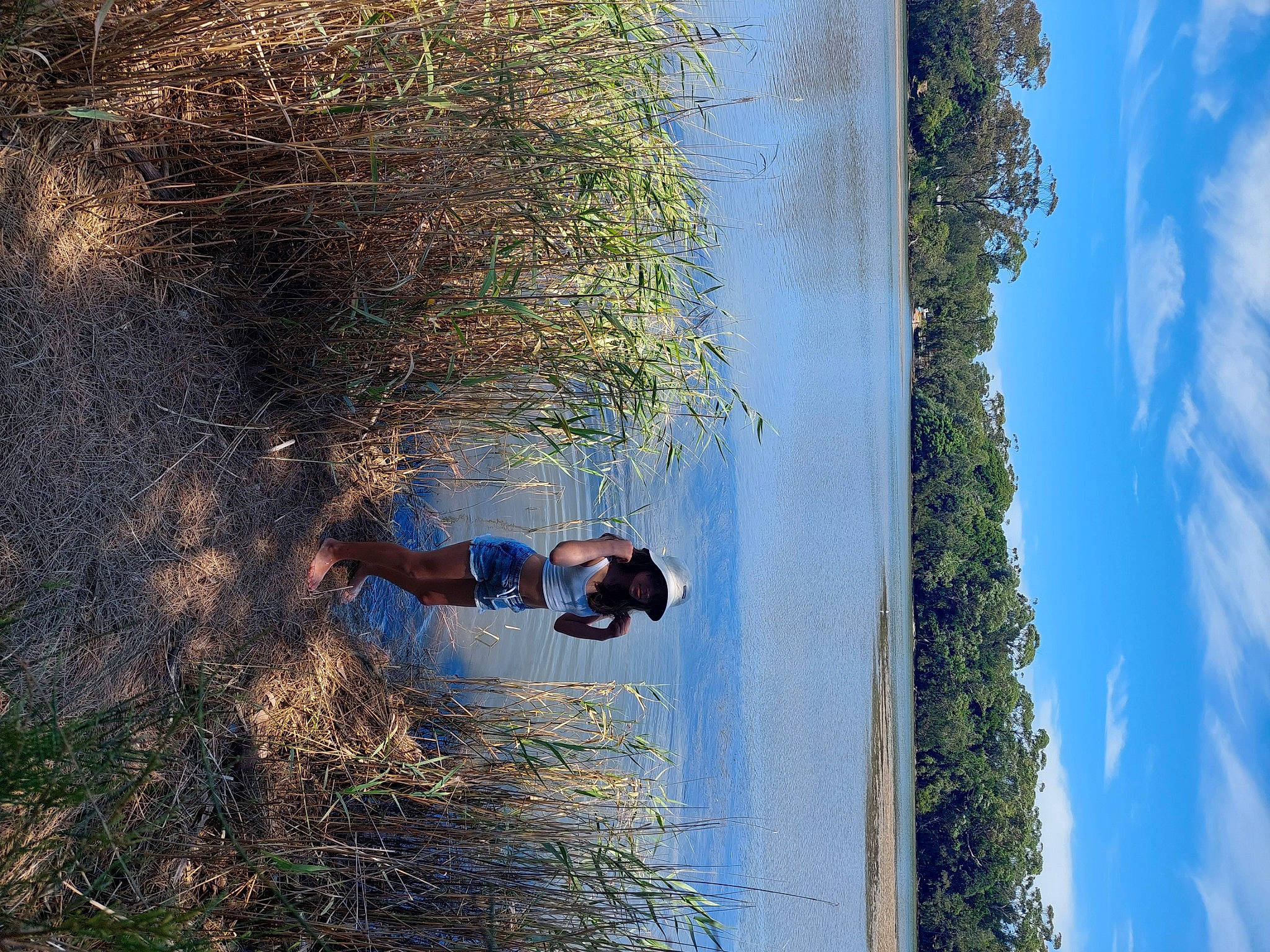 Kelsey joined the competition — help win amazing prizes! adventure, cloud, forest, fun, grass, landscape, leisure, people_in_nature, person, plant, recreation, reflection, sky, sunlight, tints_and_shades, tree, trunk, under_exposed, vegetation, water