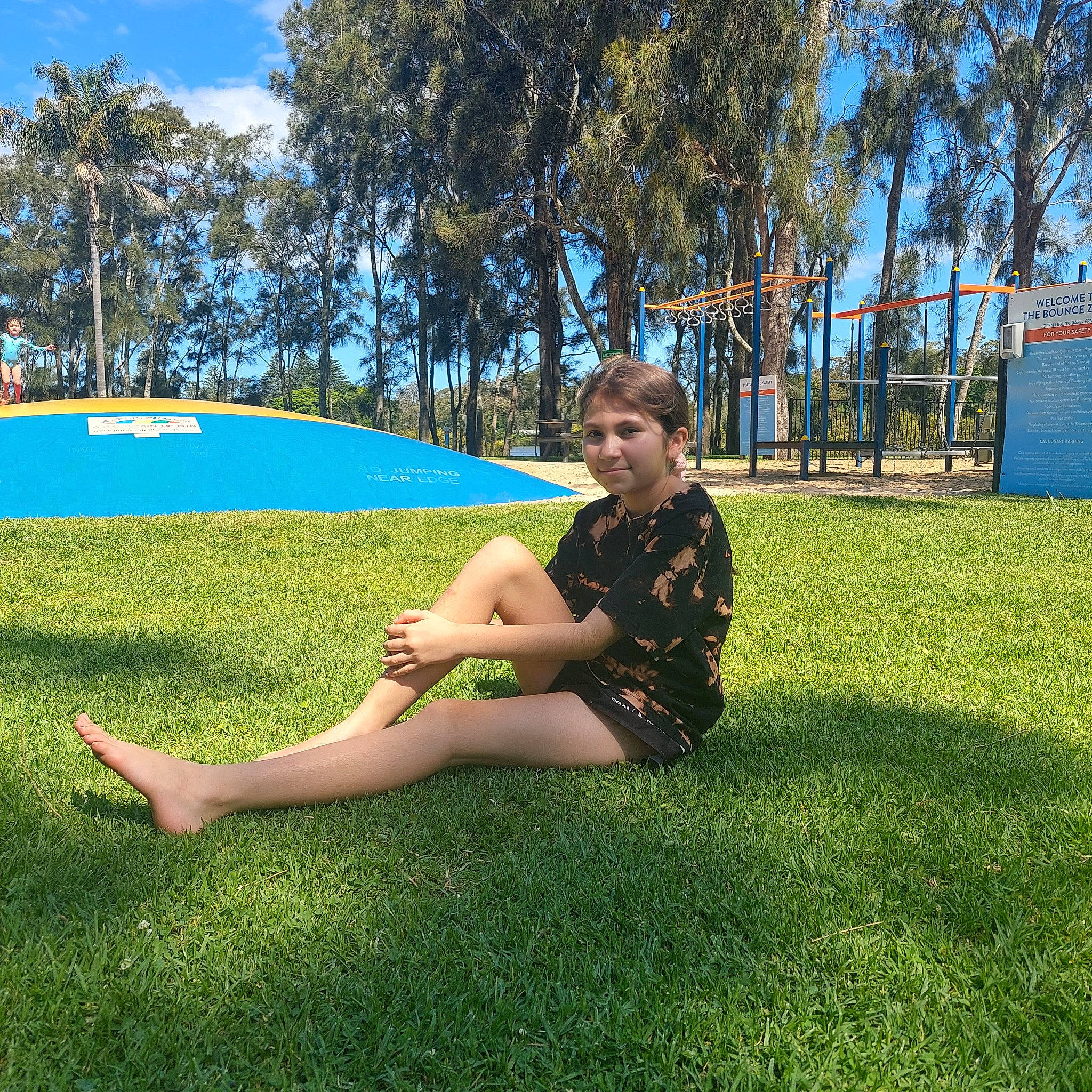 Kelsey joined the competition — help win amazing prizes! fun, grass, grass_family, grassland, happy, joy, leg, leisure, meadow, nature, outdoor_furniture, people_in_nature, person, plant, recreation, shade, shorts, sky, smile, thigh