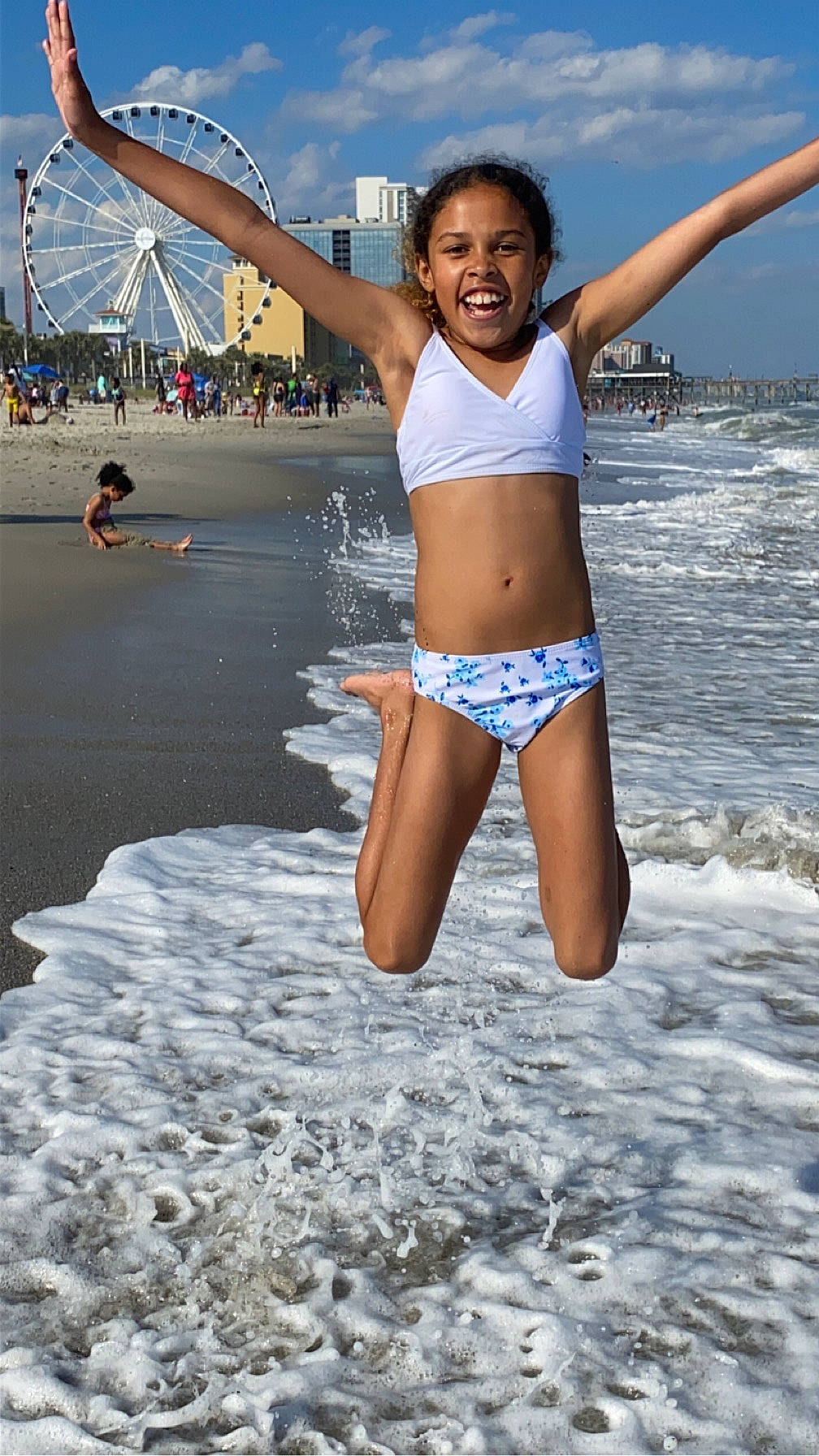 Morgan joined the competition — help win amazing prizes! arm, beach, body_of_water, brassiere, cloud, fun, hair, happy, human_body, joy, lingerie_top, people_in_nature, people_on_beach, person, sky, smile, swimsuit_top, swimwear, thigh, undergarment