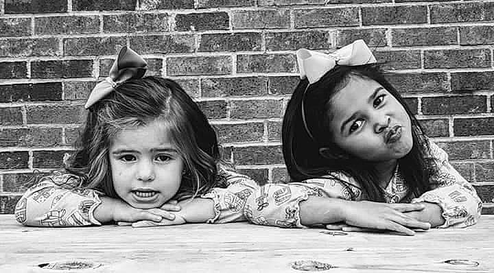 Morgan is registered to the contest to win money with this photo: black, black_and_white, eye, face, flash_photography, flooring, fun, grass, happy, headgear, human, monochrome, monochrome_photography, person, photograph, plant, smile, snapshot, style, toddler