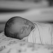 Laytin joined the competition — help win amazing prizes! child, newborn, baby, infant, sleeping, swaddled, blanket, bedding, pillow, peaceful, portrait, closeup, face, head, lips, eyelashes, black_and_white, monochrome, nursery, soft_texture