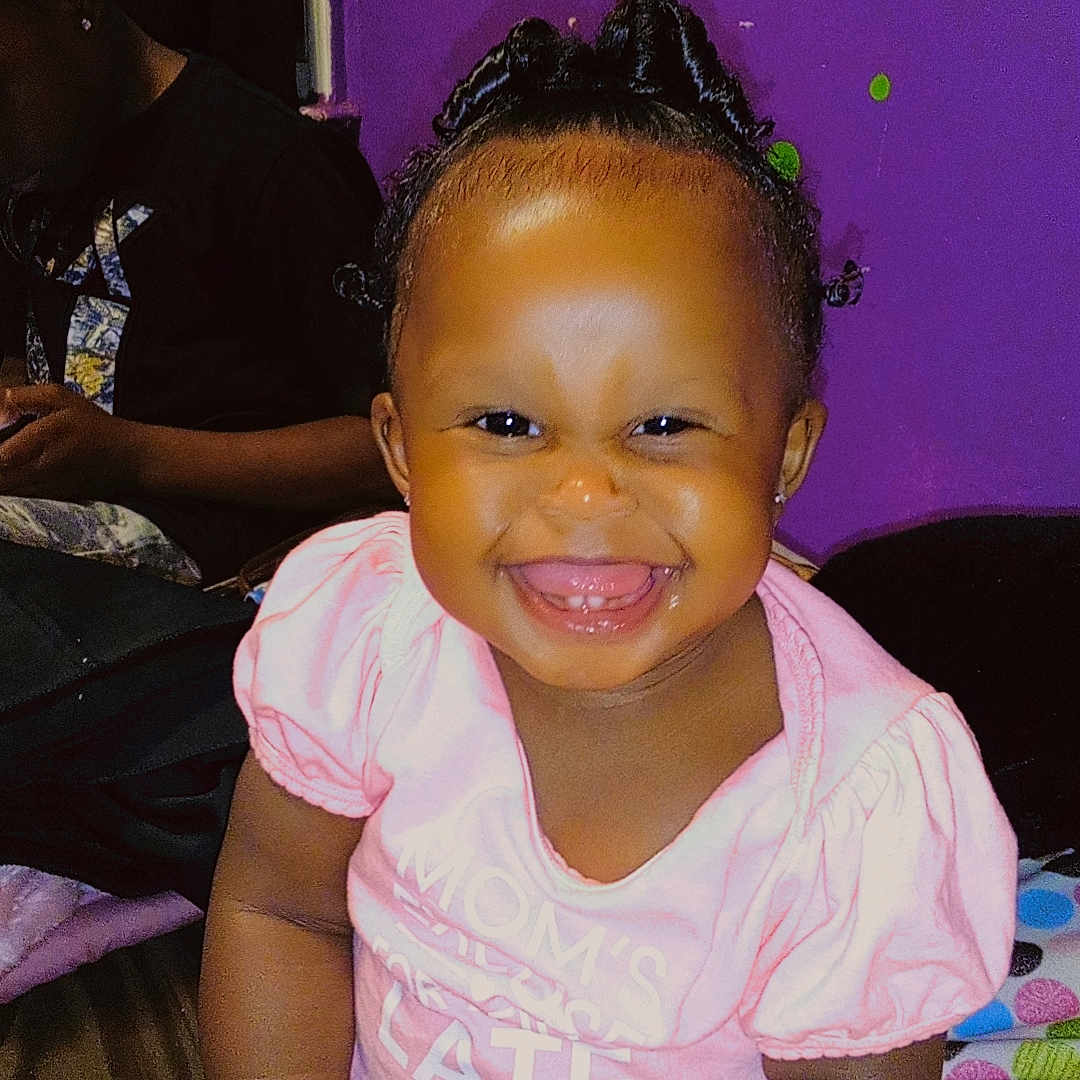 La'Nyiah joined the competition — help win amazing prizes! adult, baby, babylaughing, bodypart, child, face, female, finger, girl, hand, happy, head, male, man, mouth, person, photography, portrait, sitting, smile