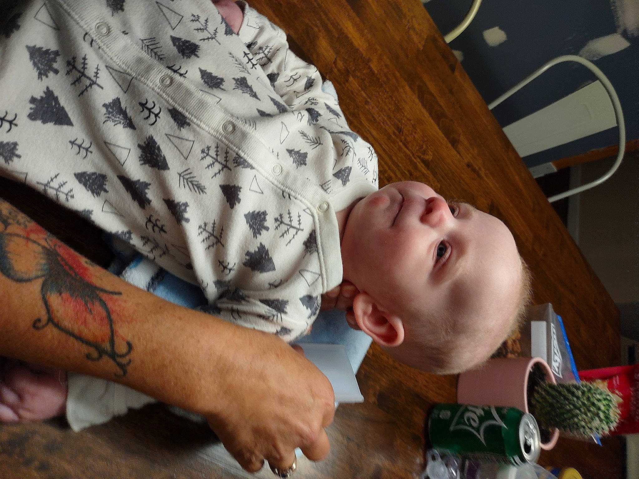 Jaxxon joined the competition — help win amazing prizes! baby, baby_toddler_clothing, chest, child, comfort, elbow, finger, flooring, human_leg, mouth, nose, pattern, person, room, skin, sleeve, t_shirt, temporary_tattoo, toddler, wood