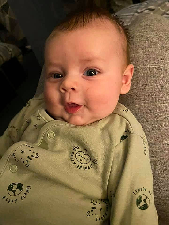 Alec joined the competition — help win amazing prizes! baby, baby_toddler_clothing, brown, cheek, collar, ear, eyebrow, facial_expression, finger, forehead, human_body, iris, lip, mouth, nose, person, product, skin, sleeve, smile