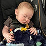baby, blanket, bodypart, car, car_interior, carseat, clothing, coat, face, finger, hand, head, jacket, newborn, person, photography, portrait, sleeping, transportation, vehicle