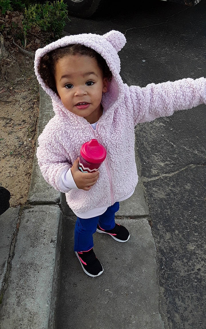 Arianna joined the competition — help win amazing prizes! baby, child, fun, headgear, outerwear, person, pink, play, skin, smile, toddler, winter