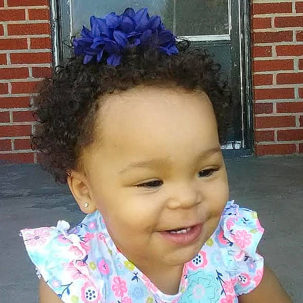 Arianna joined the competition — help win amazing prizes! cheek, child, ear, face, fashion_accessory, flower, forehead, hair, hair_accessory, hairstyle, head, headgear, joy, person, plant, smile, toddler