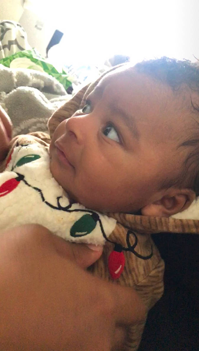 Kairo is registered to the contest to win money with this photo: baby, child, chin, cool, eye, eyebrow, eyelash, fun, grass, happy, human, leisure, lip, mammal, mouth, nose, person, skin, toddler, trunk