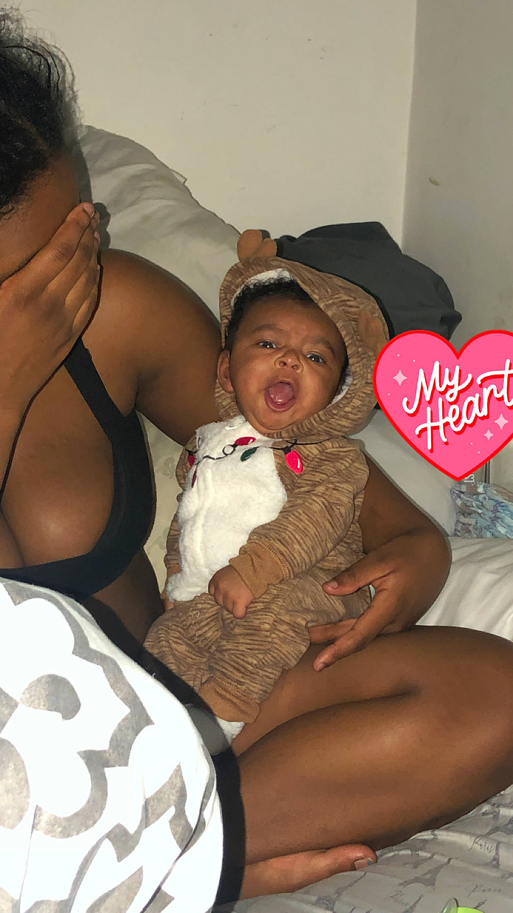 Kairo joined the competition — help win amazing prizes! baby, black, chest, comfort, fun, hairstyle, happy, human, interaction, joint, lap, leg, mammal, mouth, muscle, organ, person, shoulder, skin, thigh