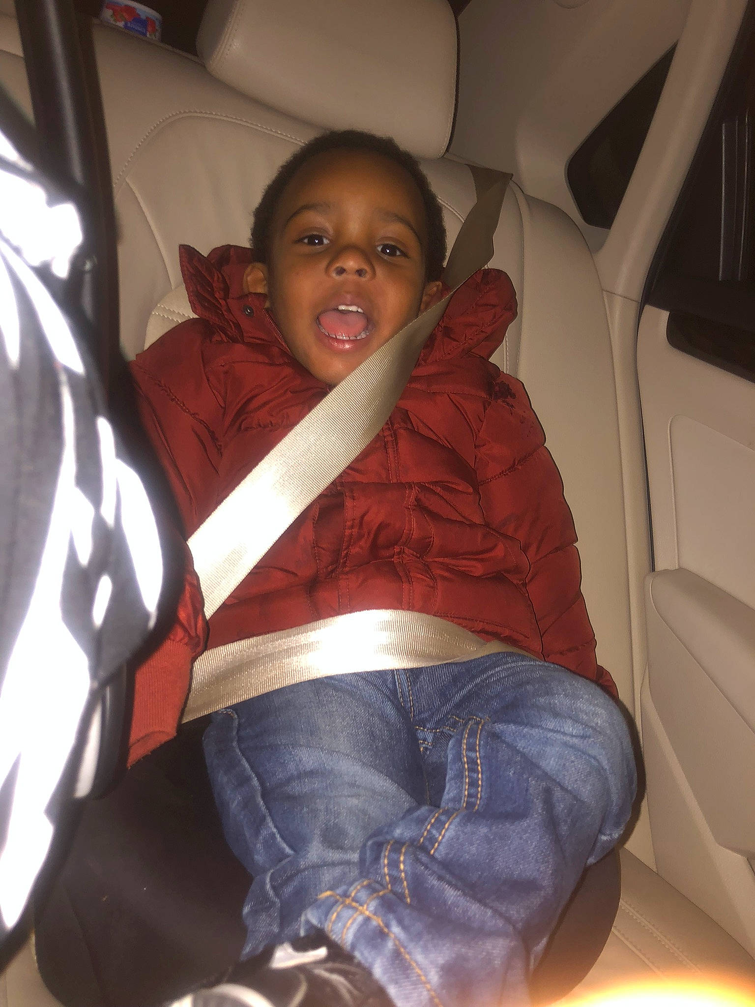 Shawnie joined the competition — help win amazing prizes! auto_part, automotive_exterior, car_seat, comfort, cool, elbow, family_car, fun, head_restraint, human_leg, jeans, knee, lap, person, seat_belt, sitting, smile, thigh, thumb, trunk