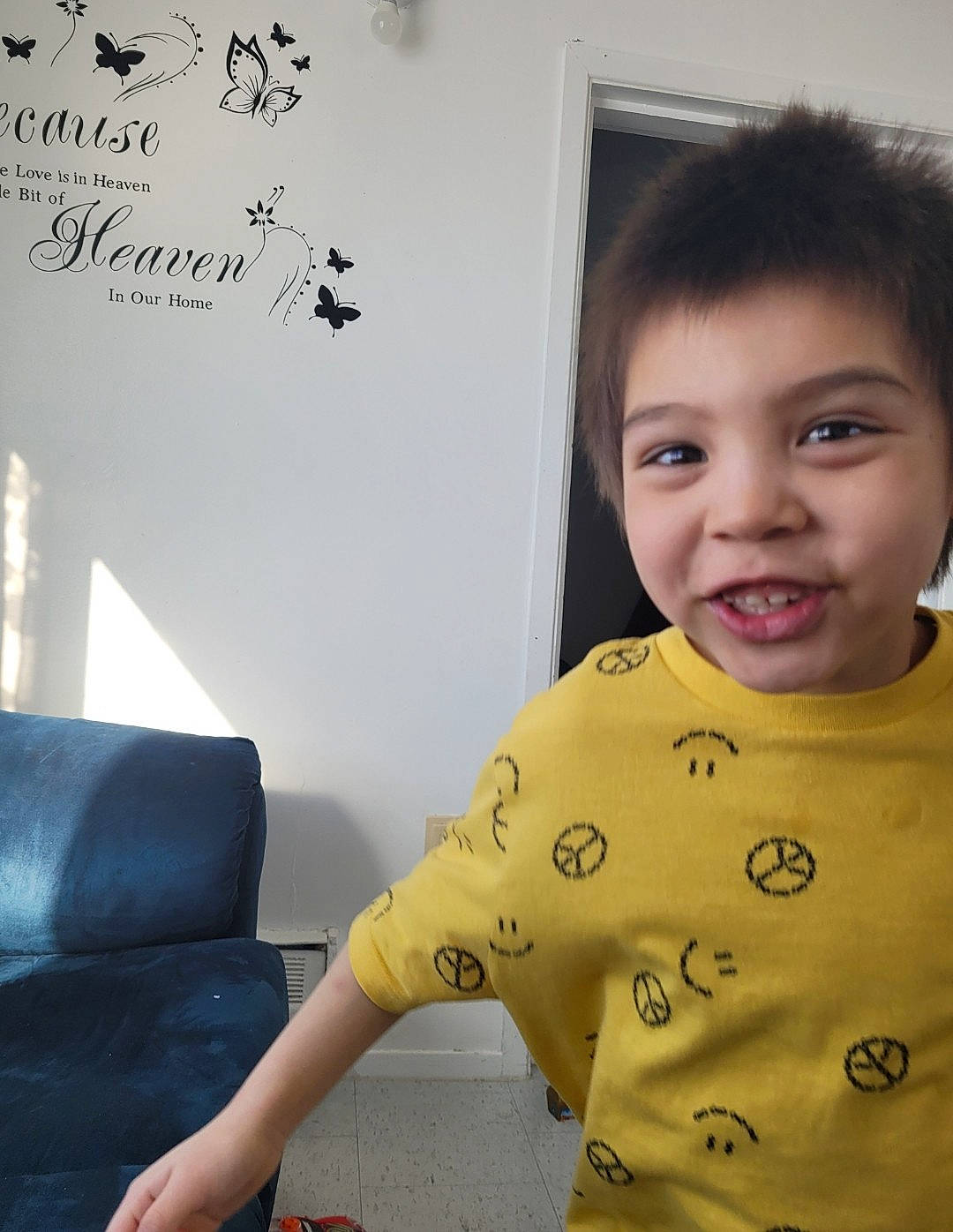Landon joined the competition — help win amazing prizes! baby, baby_toddler_clothing, black, child, comfort, couch, eye, flooring, font, happy, human_leg, joy, person, room, sitting, skin, sleeve, smile, textile, thigh