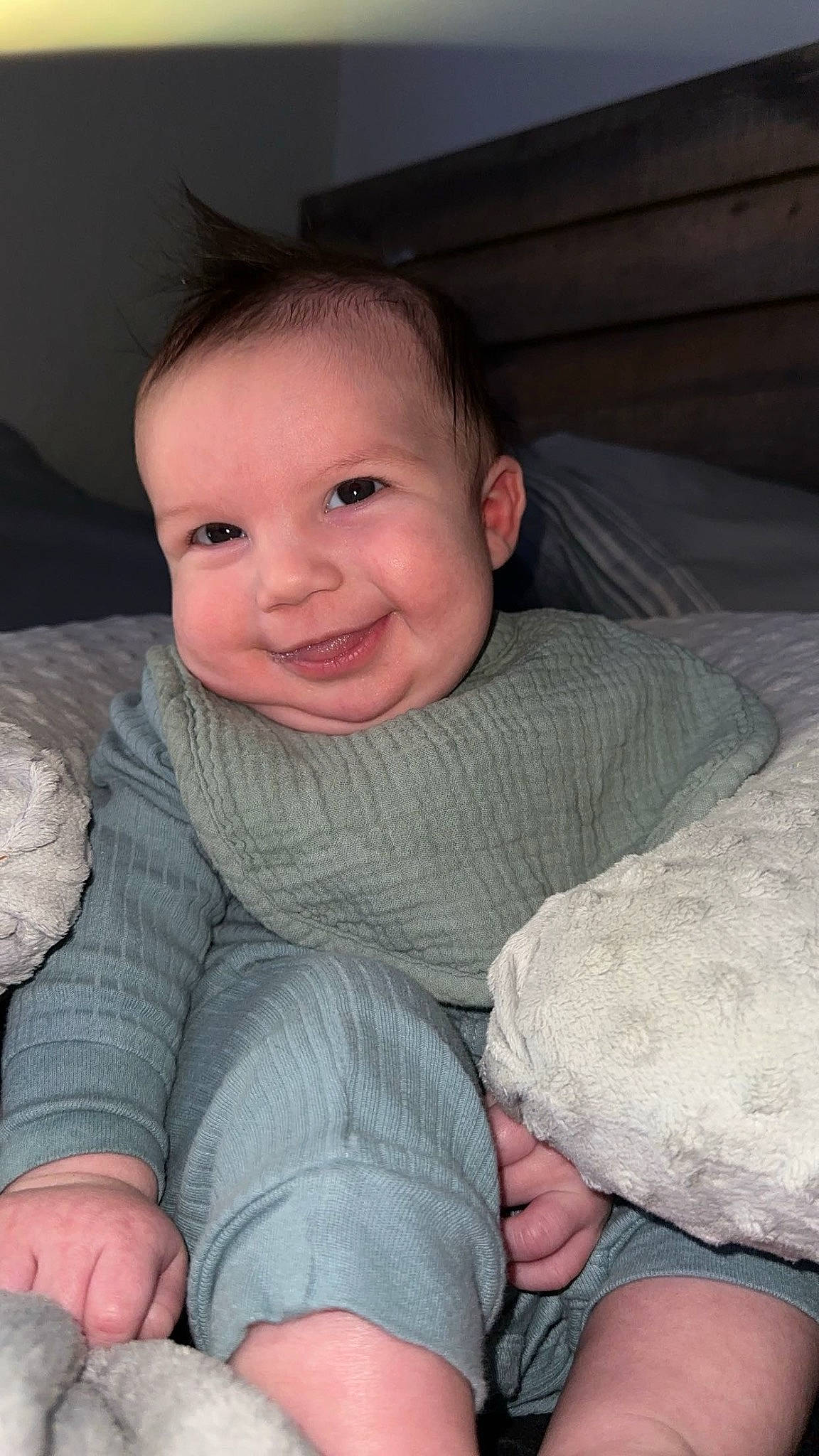 Dutton is registered to the contest to win money with this photo: baby_toddler_clothing, cheek, chin, comfort, eye, eyebrow, face, finger, flash_photography, gesture, head, iris, joy, lap, mouth, nose, person, skin, smile, thigh