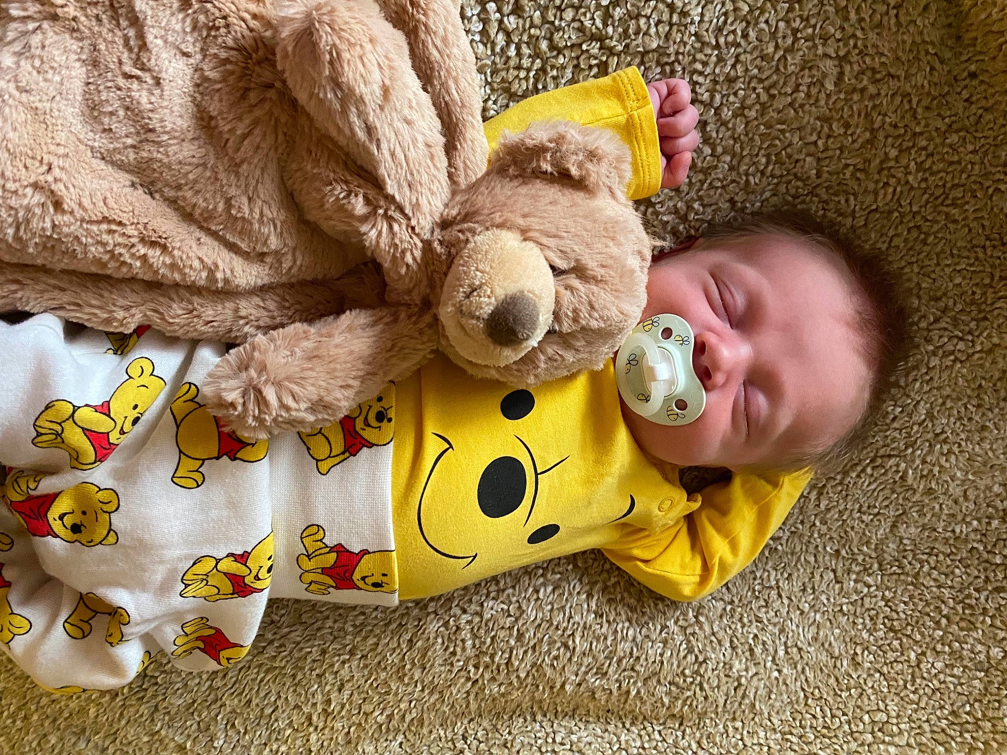 Briggs Allen is registered to the contest to win money with this photo: baby, baby_products, baby_sleeping, baby_toddler_clothing, baby_toys, carmine, child, comfort, flooring, fun, happy, linens, orange, pattern, person, plush, stuffed_toy, textile, toddler, toy
