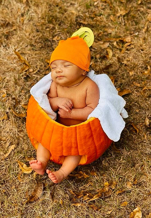Emersyn is registered to the contest to win money with this photo: autumn, baby, baby_toddler_clothing, cap, child, eye, fun, grass, happy, hat, head, headwear, jewellery, people_in_nature, person, plant, portrait_photography, sitting, soil, toddler