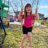 child, girl, swing, playground, outdoor, happy, smiling, grass, trees, sunny, casual_clothing, play_equipment, summer, recreation, fun, park, young, person, daylight, activity