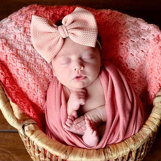 Rainie joined the competition — help win amazing prizes! baby, baby_products, baby_toddler_clothing, cap, cheek, chin, comfort, hand, head, headgear, lip, outerwear, pink, plant, sleeve, storage_basket, textile, toddler, wood, wool