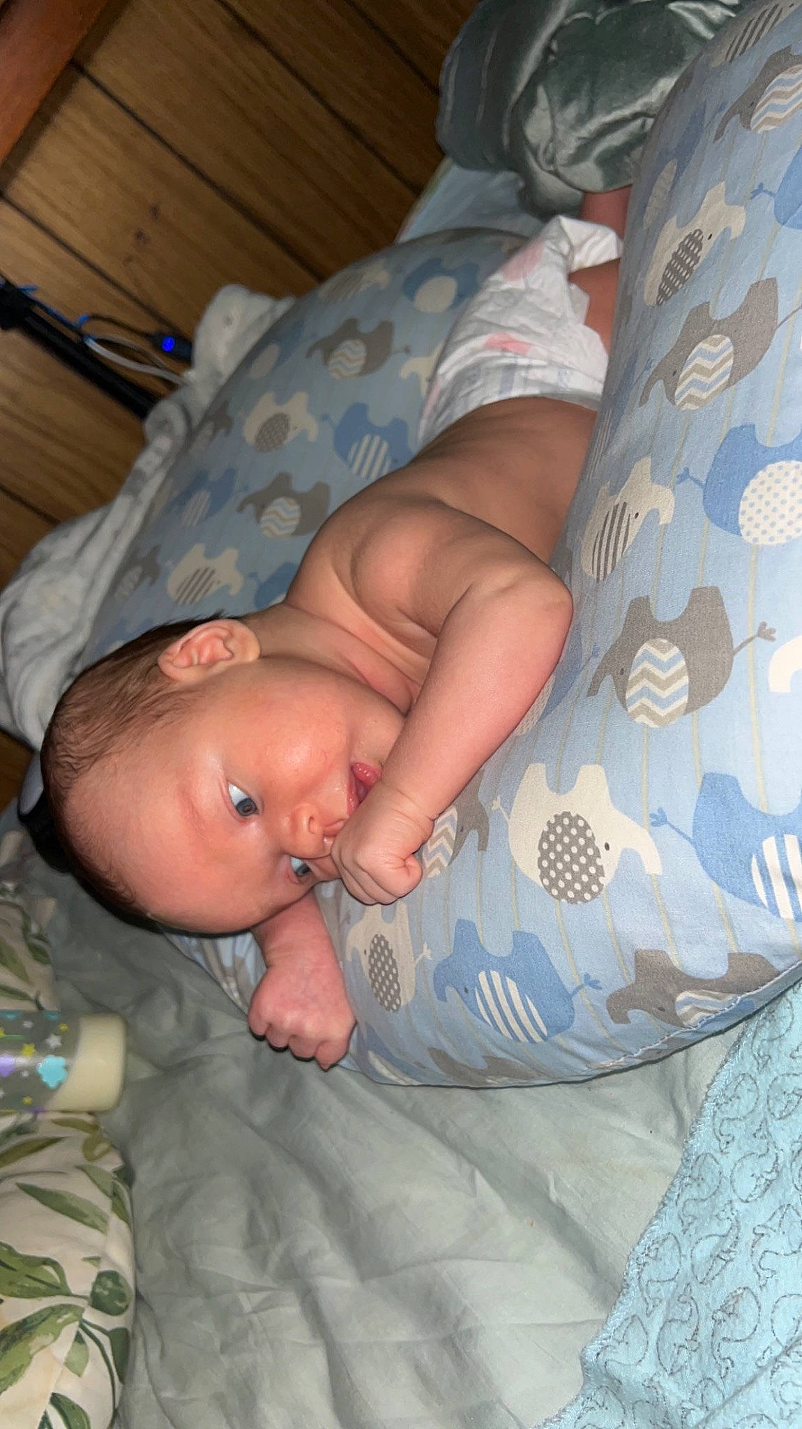 Paxton is registered to the contest to win money with this photo: baby, baby_products, baby_toddler_clothing, bedtime, child, comfort, eye, finger, hand, human_body, linens, mouth, nap, pattern, person, room, skin, sleep, textile, thumb