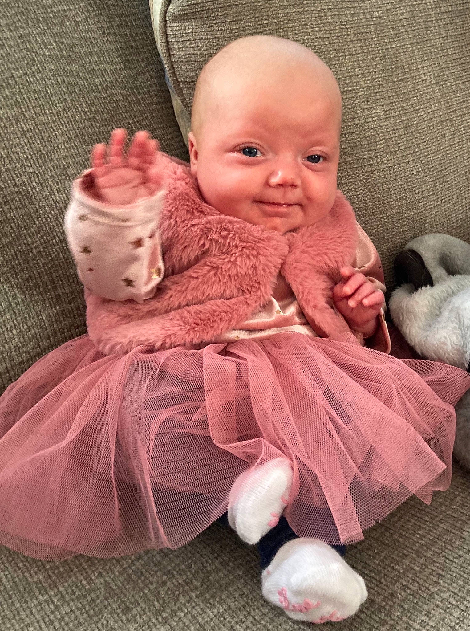 Lillyana is registered to the contest to win money with this photo: baby, baby_toddler_clothing, comfort, doll, foot, fur, gesture, human_body, leg, linens, person, pink, sitting, skin, stuffed_toy, textile, thumb, toy, wood, wool