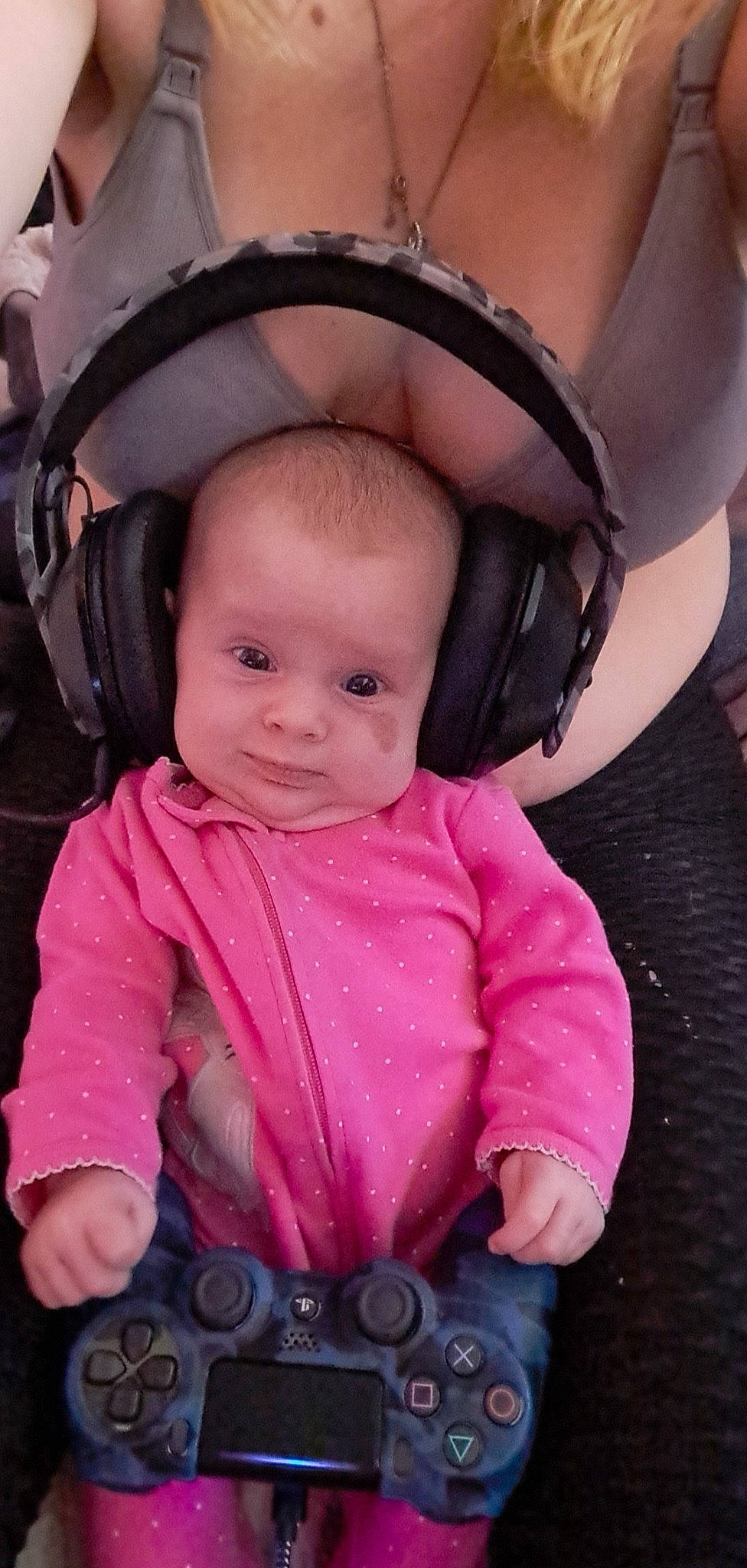 Anastasia is registered to the contest to win money with this photo: baby, baby_carriage, baby_toddler_clothing, cheek, chin, comfort, cool, eye, face, finger, happy, head, human_body, iris, mouth, nose, person, pink, skin, sleeve