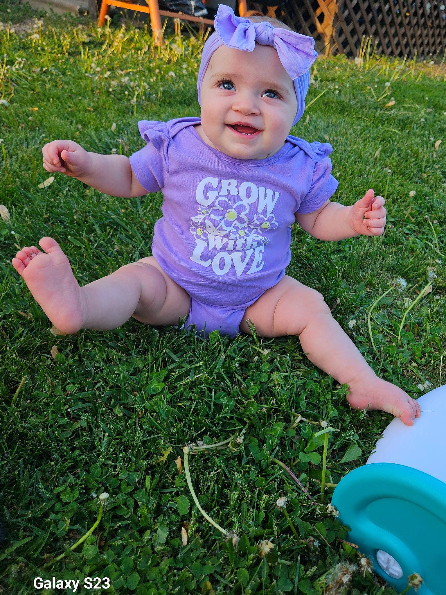 Sophia joined the competition — help win amazing prizes! baby, baby_toddler_clothing, blue, child, fun, grass, green, happy, hat, headwear, joy, lawn, leaf, leisure, light, people_in_nature, person, plant, recreation, smile