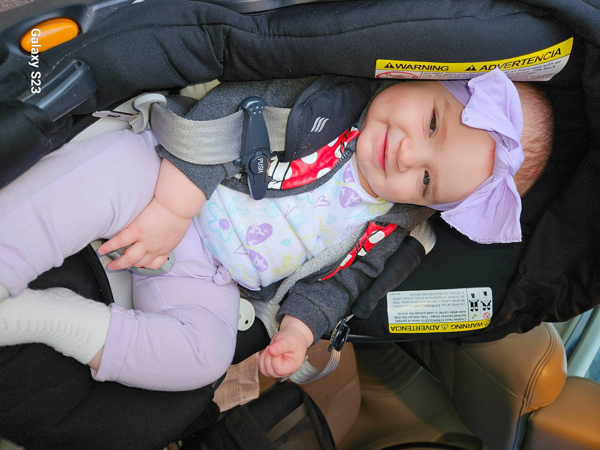 Sophia is registered to the contest to win money with this photo: auto_part, baby, baby_carriage, baby_products, baby_toddler_clothing, car_seat, car_seat_cover, carmine, child, comfort, family_car, gesture, headwear, joy, luxury_vehicle, motor_vehicle, person, product, smile, steering_wheel