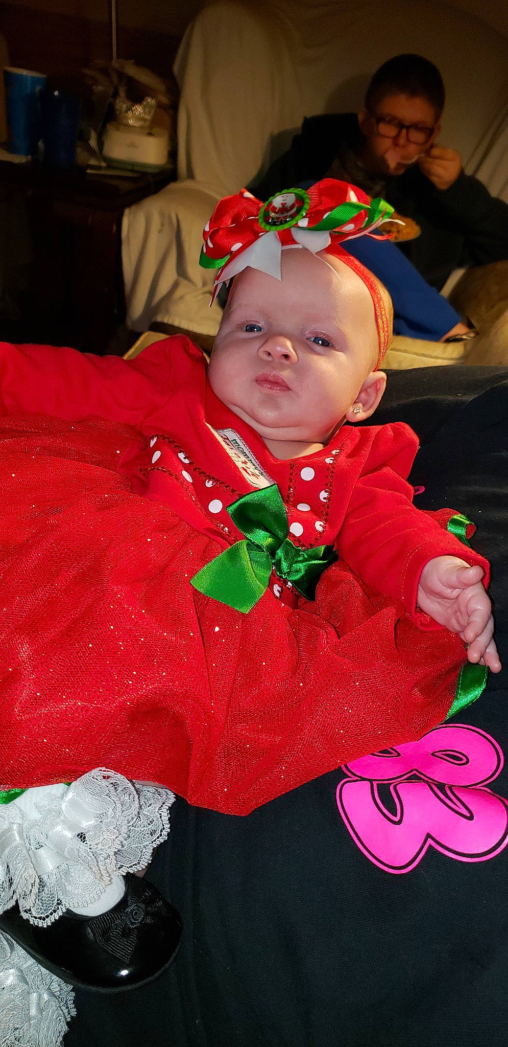 Kelly joined the competition — help win amazing prizes! baby, child, christmas, costume, fictional_character, person, red, smile, toddler