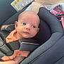 baby, infant, car_seat, child, seatbelt, clothing, blanket, safety, cute, young, portrait, head, face, person, indoors, fabric, comfort, seat, restraint, newborn