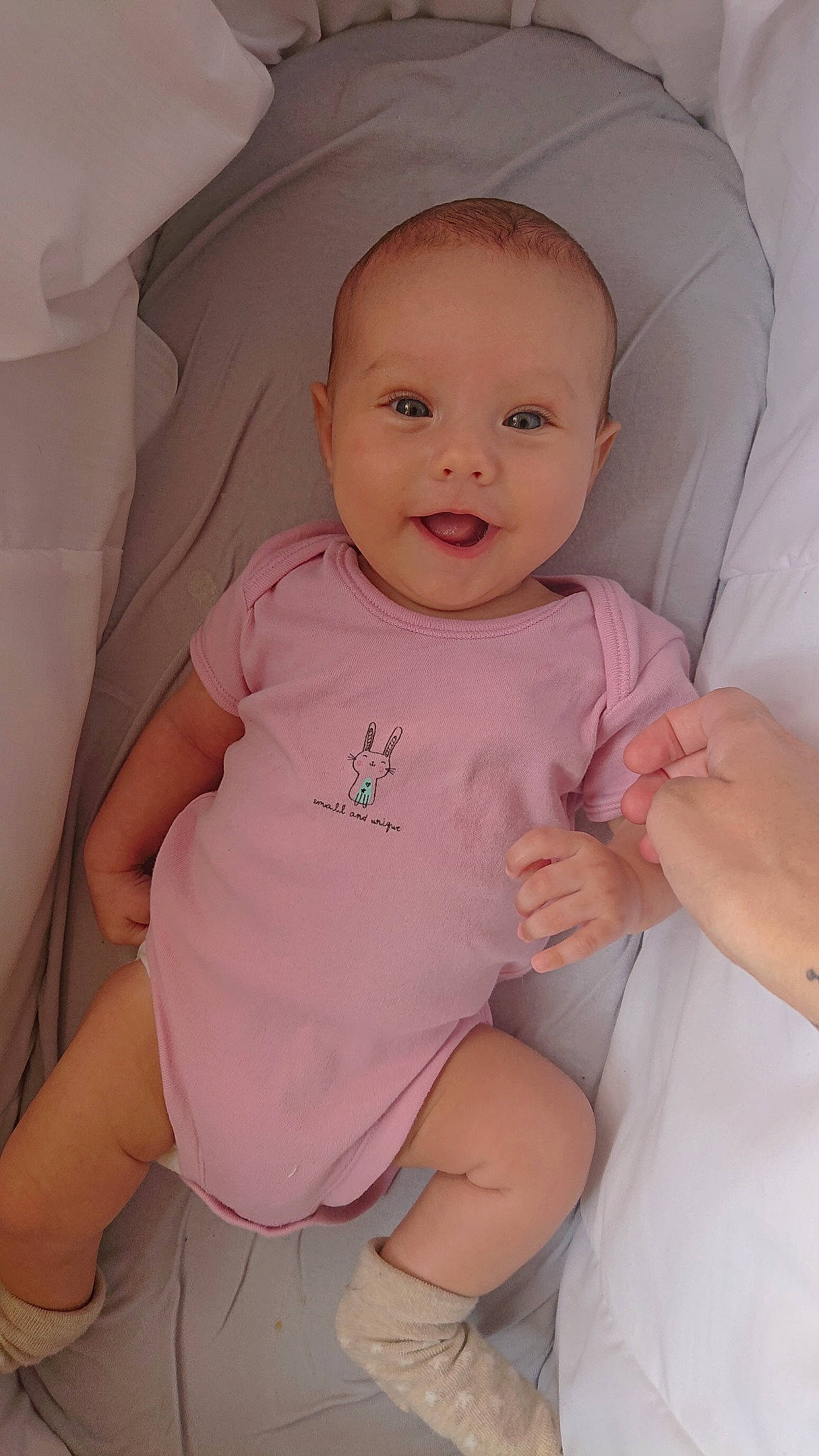 Lilian is registered to the contest to win money with this photo: baby, baby_products, baby_toddler_clothing, cheek, child, eye, face, head, iris, lip, person, pink, product, skin, toddler