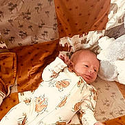 Jamison joined the competition — help win amazing prizes! baby, infant, onesie, sleepwear, blanket, patchwork, stuffed_animal, koala, cuddly, sleeping_area, bedroom, soft_toys, child, newborn, cute, smiling, lying_down, comfortable, cozy, home