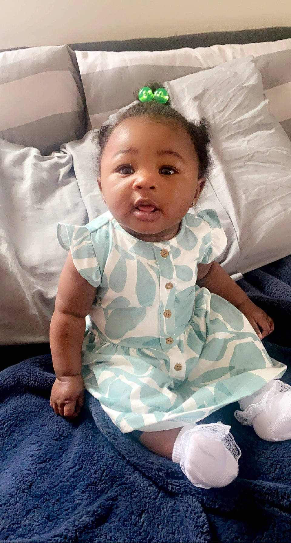 Jada joined the competition — help win amazing prizes! baby, baby_toddler_clothing, cheek, child, comfort, eye, eyelash, face, fun, happy, head, iris, linens, people, person, product, room, sitting, skin, sleeve