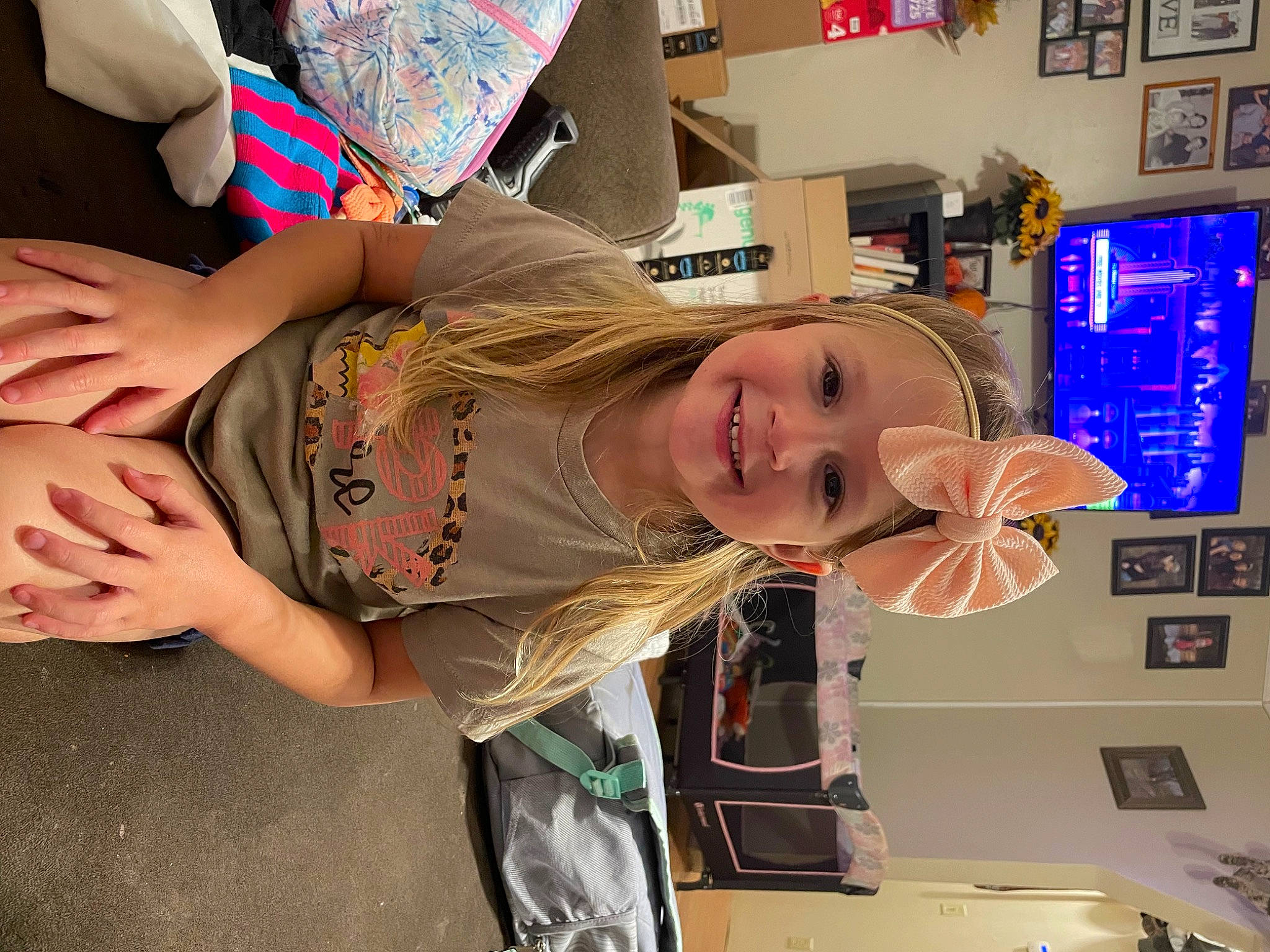 Haylie joined the competition — help win amazing prizes! blond, child, display_device, elbow, eyewear, fun, happy, human_leg, joy, machine, person, picture_frame, room, shoulder, smile, t_shirt, television, thigh, wrist