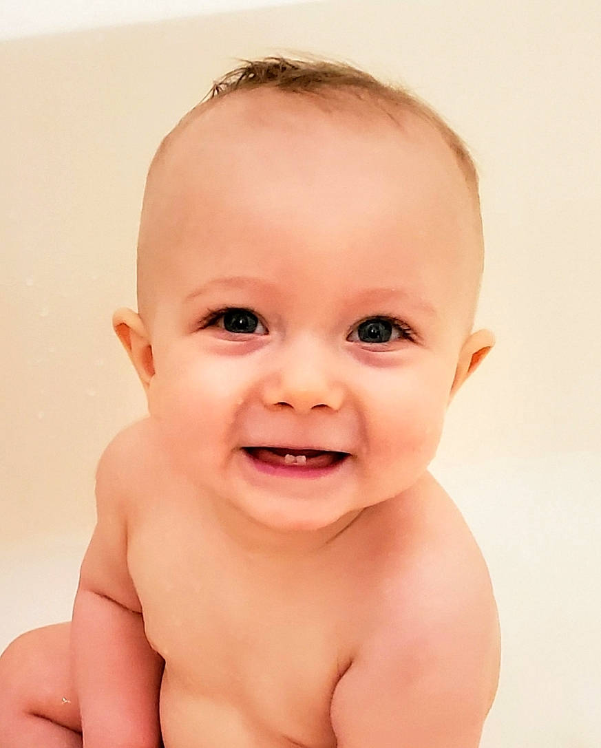 Travis is registered to the contest to win money with this photo: baby, baby_laughing, baby_making_funny_faces, cheek, child, child_model, chin, close_up, face, facial_expression, forehead, head, joy, laugh, lip, mouth, nose, person, photography, skin