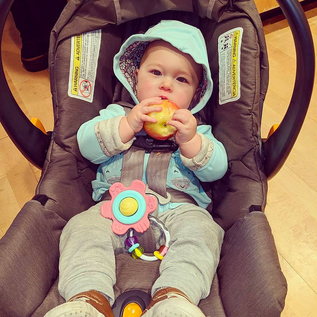Aila is registered to the contest to win money with this photo: baby, baby_in_car_seat, baby_products, child, cool, happy, person, play, product, sitting, smile, toddler