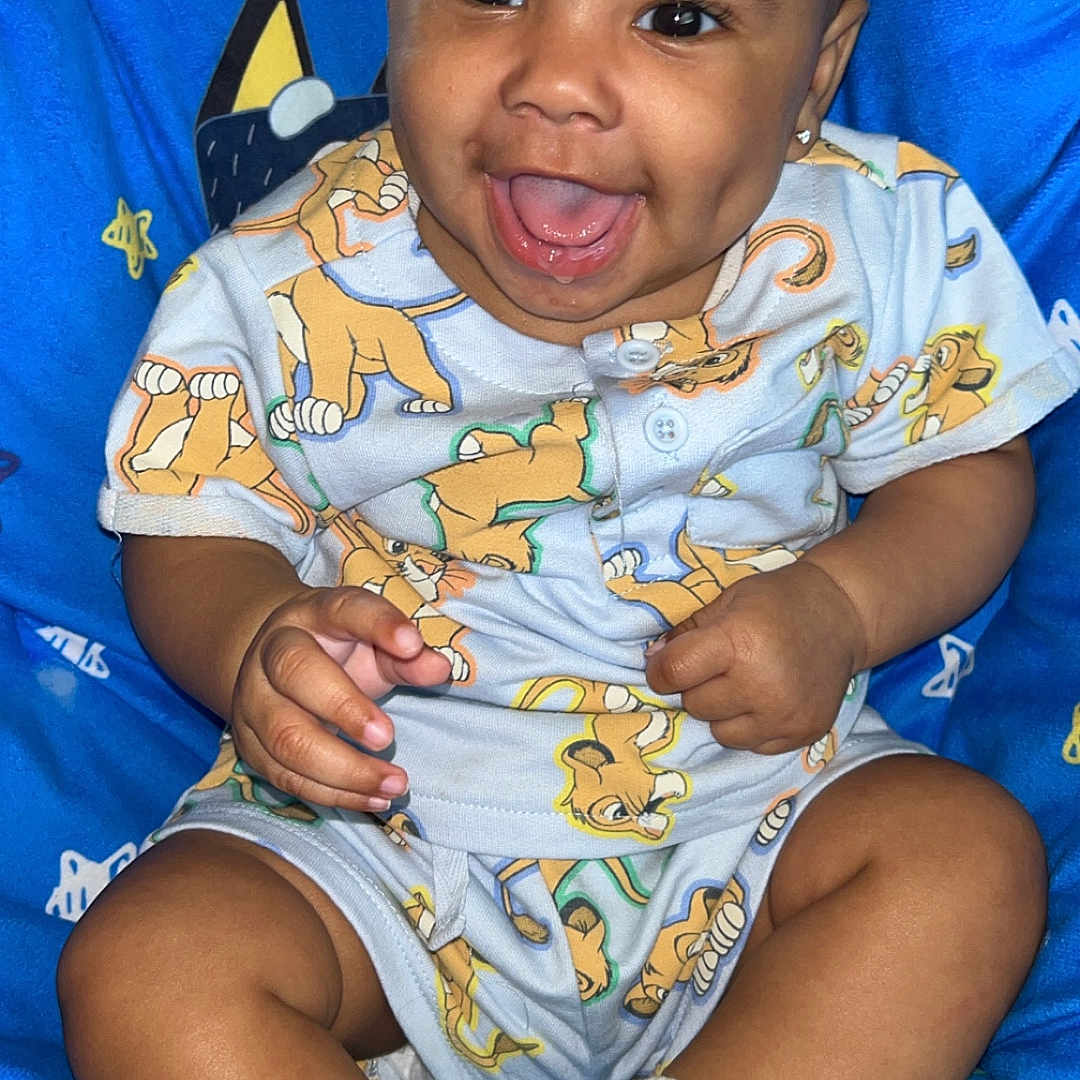 Daymonte joined the competition — help win amazing prizes! baby, babylaughing, bodypart, clothing, face, furniture, happy, head, hosiery, laughing, mouth, person, photography, portrait, shorts, sitting, smile, sock, t_shirt, teeth