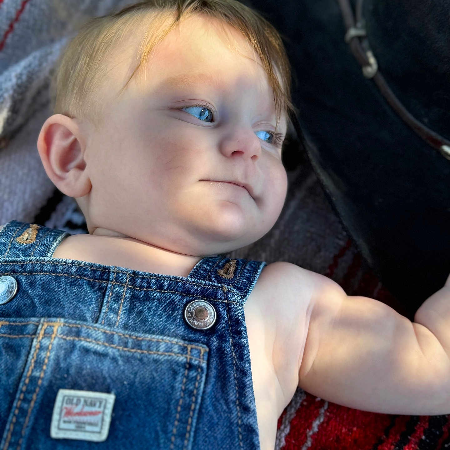 Jake joined the competition — help win amazing prizes! accessories, baby, bodypart, clothing, coat, face, finger, frown, hand, head, jacket, jeans, newborn, pants, person, photography, portrait, sad, t_shirt, vest