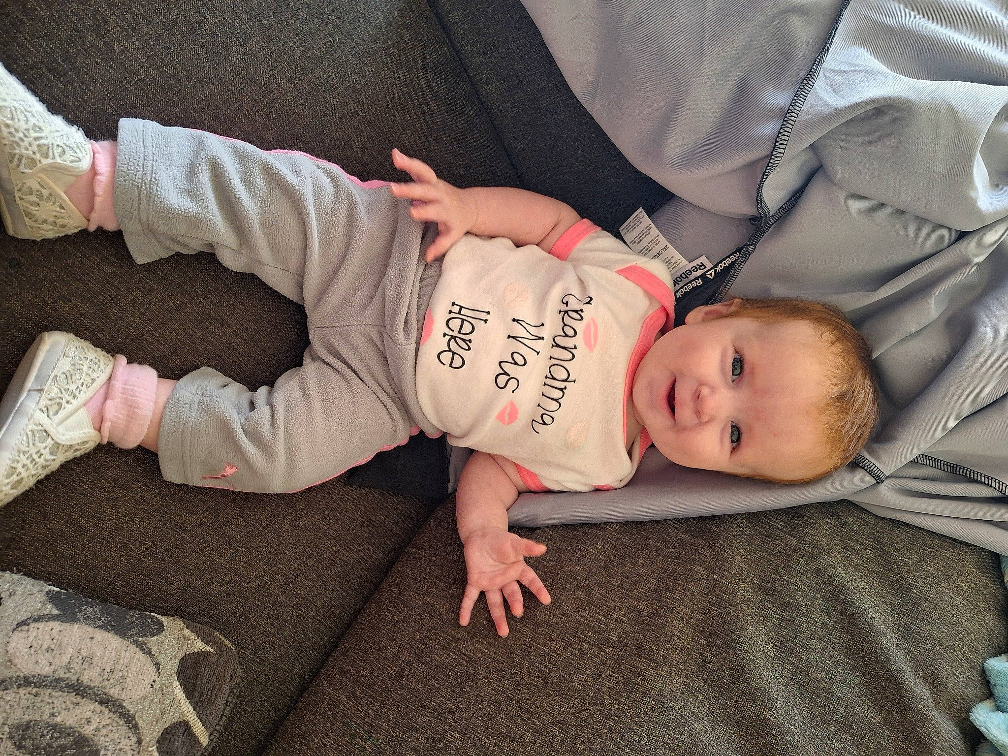 Victoria joined the competition — help win amazing prizes! baby, baby_products, baby_toddler_clothing, child, comfort, eye, finger, flooring, foot, human_leg, leg, linens, mammal, nail, person, skin, sleeve, sock, thigh, toddler