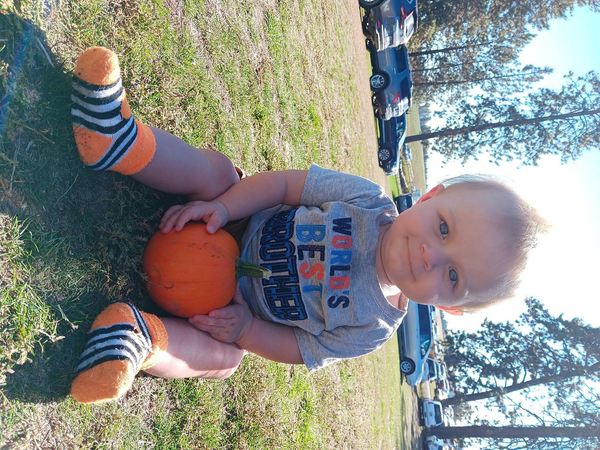 Xaeden joined the competition — help win amazing prizes! facial_expression, finger, fun, grass, hand, happy, joy, leaf, leisure, light, people_in_nature, person, photograph, plant, shorts, sky, smile, sunlight, thigh, tree