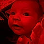 Mckenley is registered to the contest to win money with this photo: baby, face, pacifier, close_up, red_light, infant, expression, cute, indoors, portrait, child, curious, soft_texture, clothing, person, newborn, sleepwear, baby_girl, candid, warm_lighting