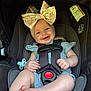 Mckenley joined the competition — help win amazing prizes! baby, car_seat, child, infant, smiling, bow, headwear, harness, safety, cute, hands, feet, blue_clothing, pacifier, seat, child_safety, portrait, indoor, happy, person