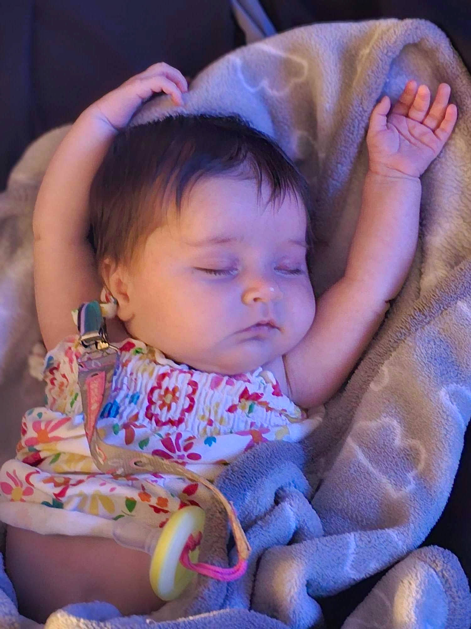 Izabella is registered to the contest to win money with this photo: baby, baby_toddler_clothing, cheek, child, chin, comfort, ear, eye, eyebrow, eyelash, finger, happy, iris, lip, mouth, nose, person, pink, purple, skin