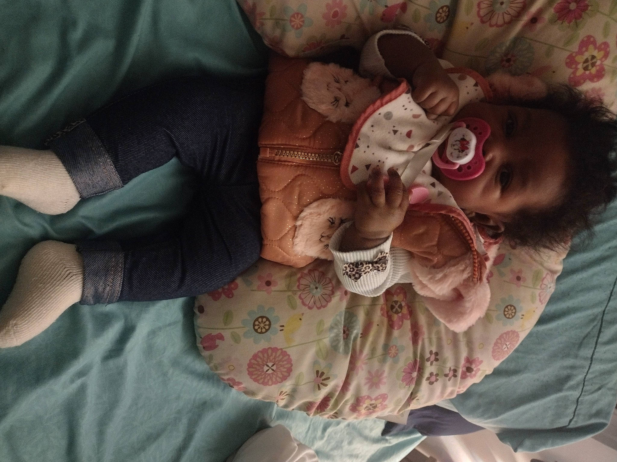 Cherrish is registered to the contest to win money with this photo: arm, baby, cheek, chest, child, comfort, elbow, finger, human_body, human_leg, linens, mouth, neck, pattern, person, skin, sleeve, textile, toddler, trunk