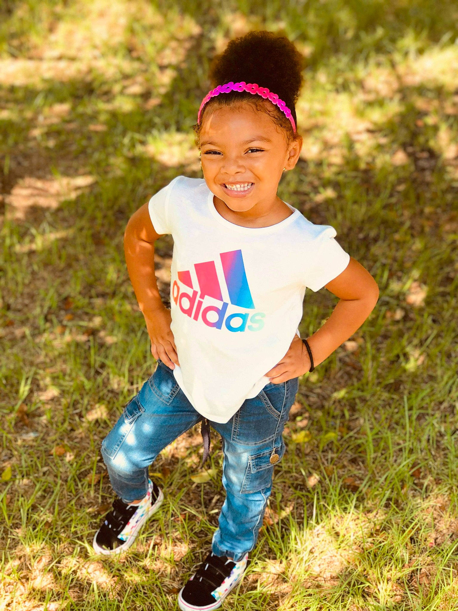 Ma'Laija is registered to the contest to win money with this photo: child, child_model, cool, fun, grass, hair_accessory, happy, headband, joy, person, photography, plant, play, smile, t_shirt, toddler