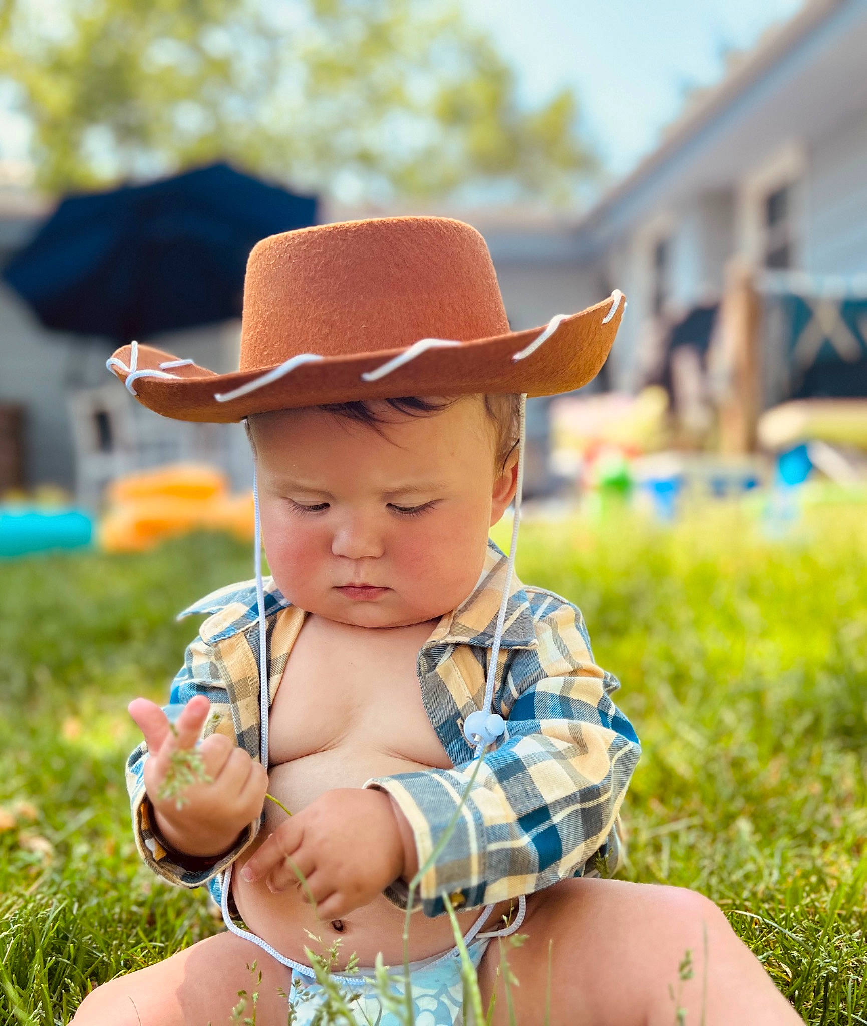 Romeo joined the competition — help win amazing prizes! baby, baby_toddler_clothing, fashion_accessory, fedora, fun, grass, happy, hat, headwear, leisure, pattern, person, plant, play, recreation, sitting, skin, spring, summer, sun_hat