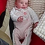 baby, infant, onesie, pink, flower, blanket, cushion, plush, soft, comfortable, indoor, red_background, texture, child, portrait, resting, cute, face, hand, feet