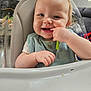 Aubriana is registered to the contest to win money with this photo: baby, bathing, bathtub, bodypart, cutlery, eating, face, finger, food, furniture, hand, happy, head, mouth, person, photography, portrait, smile, spoon, tub