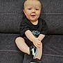 Aubriana joined the competition — help win amazing prizes! baby, clothing, couch, cushion, face, footwear, furniture, head, homedecor, indoors, jeans, pants, person, photography, portrait, shoe, shorts, sitting, sneaker, t_shirt